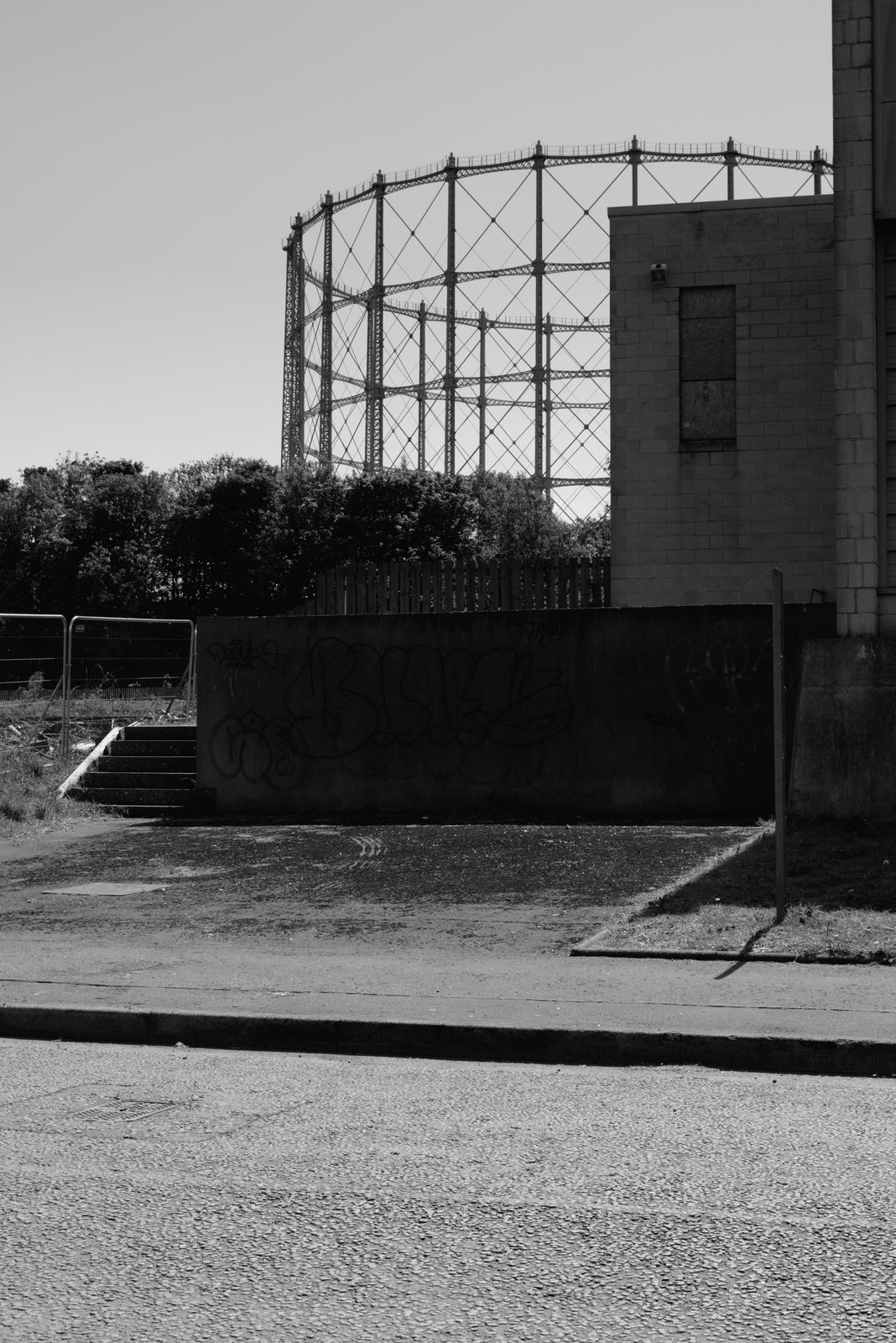 Industrial texture photograph — weathered metal, concrete and structural detail